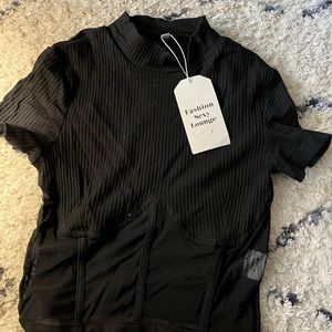 Black tee shirt with tag still on